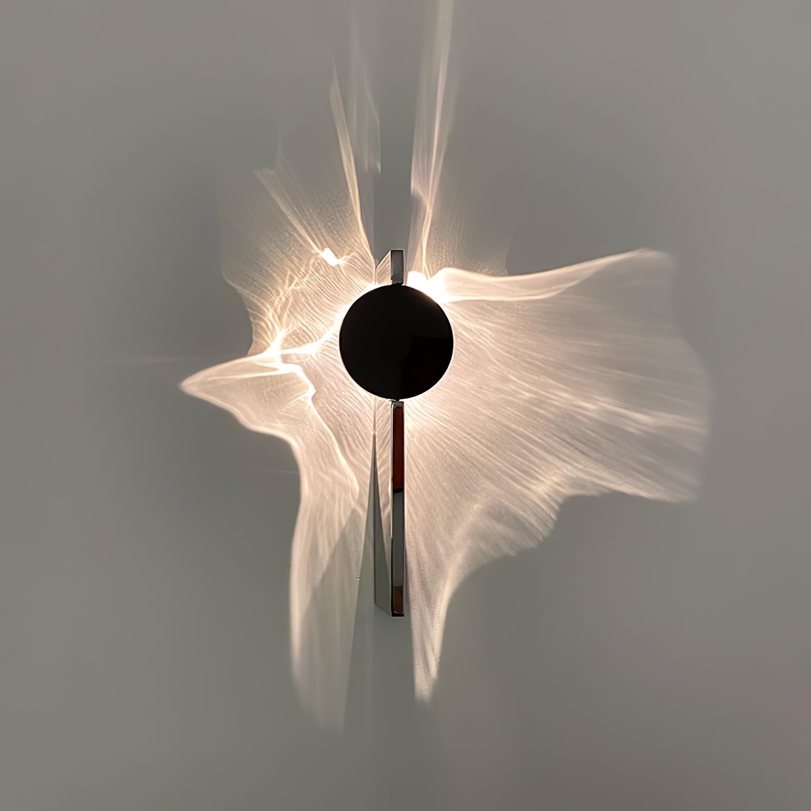 LED Wandlamp Projectie – Artistiek Lichteffect – Chroom | Umbra