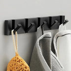 Gancio Fold | Luxe Inklapbare Wandhaken – Ruimtebesparend Aluminium – Zwart & Goud
