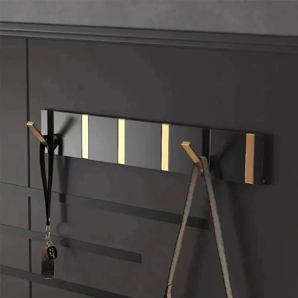 Gancio Fold | Luxe Inklapbare Wandhaken – Ruimtebesparend Aluminium – Zwart & Goud